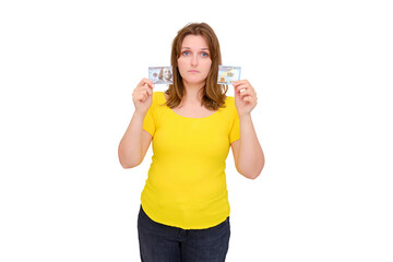 Empty house and torn money in the hands of a young woman. US dollar mortgage crisis in America, isolated on a white background