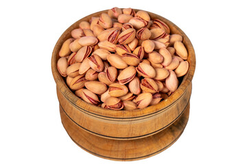 Pistachios in wooden bowl. Pistachios isolated on white background.