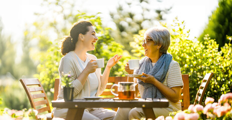 women drinking tea in the garden