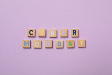 Cyber monday message with shopping cart on light background.