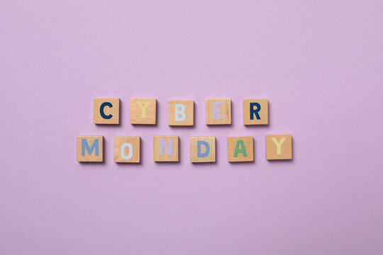 Cyber monday message with shopping cart on light background.