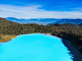 Obraz premium Aerial drone view of People camping by the crater lake on top of the mountain