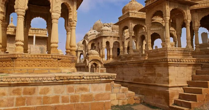 Bada bagh cenotaphs (Hindu tomb mausoleum) made of sandstone in Indian Thar desert. Jaisalmer, Rajasthan, India, Asia