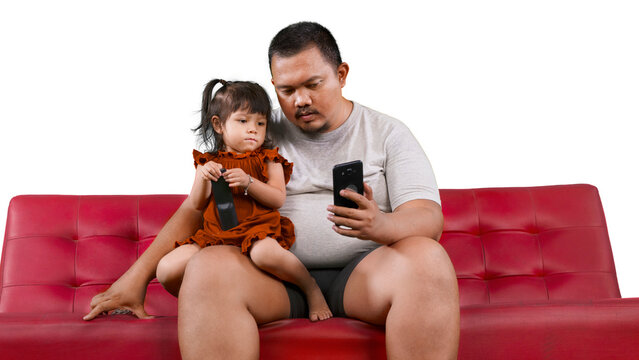 Father And Daughter Watching Online Video Streaming On A Mobile Phone Isolated On White Background