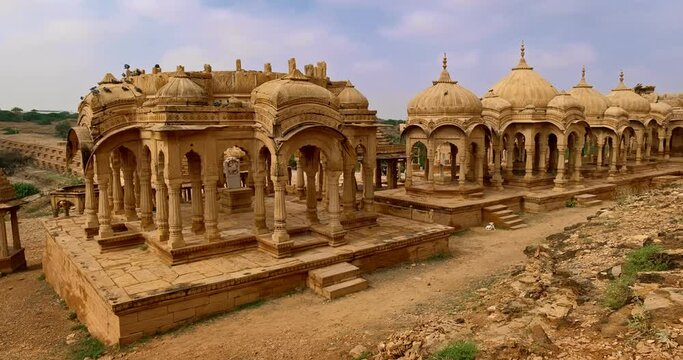 Bada bagh cenotaphs (Hindu tomb mausoleum) made of sandstone in Indian Thar desert. Jaisalmer, Rajasthan, India, Asia