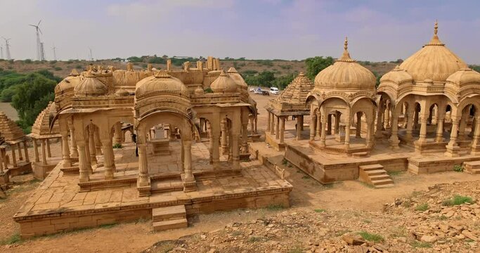 Bada bagh cenotaphs (Hindu tomb mausoleum) made of sandstone in Indian Thar desert. Jaisalmer, Rajasthan, India, Asia