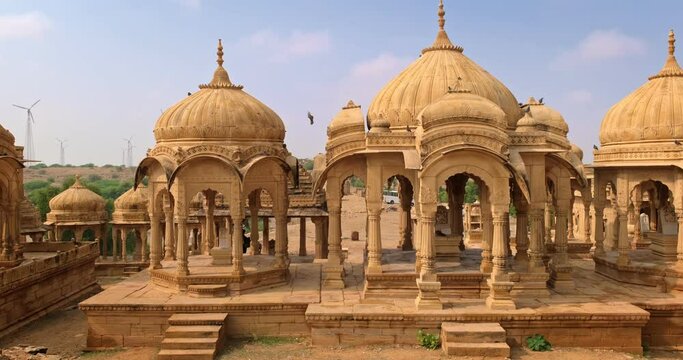 Bada bagh cenotaphs (Hindu tomb mausoleum) made of sandstone in Indian Thar desert. Jaisalmer, Rajasthan, India, Asia