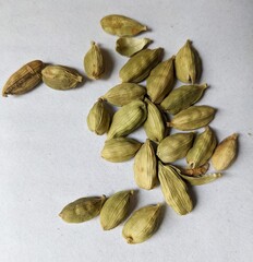 Green cardamom organic spice on white background  