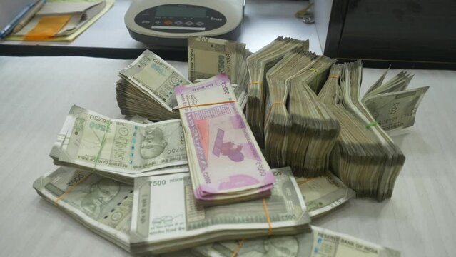 Stack of 2000 and 500 Rupee banknotes, India