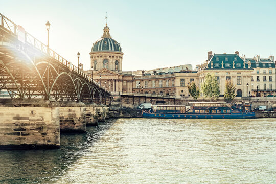 France, Ile-de-France, Paris, Institut de France and Pont des Arts at sunset