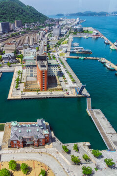 Japan, Fukuoka Prefecture, Kitakyushu, Aerial view of Mojiku ward waterfront in summer