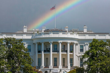 White House in Washington DC on colorful rainbow sky background
