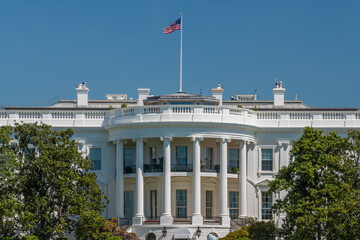 Fototapeta na wymiar White House in Washington DC on deep blue sky background