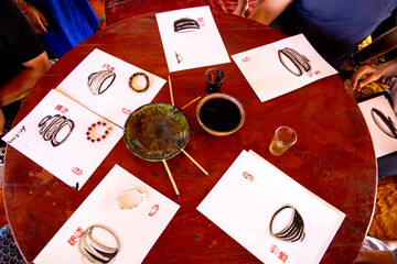 Zen sesshin (retreat) in the Sahara desert, Morocco. Calligraphy workshop.