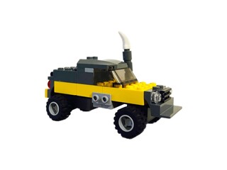 toy truck isolated on white © ольга алфеева