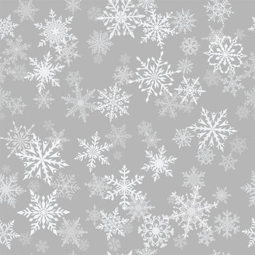Christmas seamless pattern of beautiful complex snowflakes in gray and white colors. Winter background with falling snow