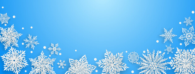 Christmas illustration with beautiful complex paper snowflakes, white on light blue background