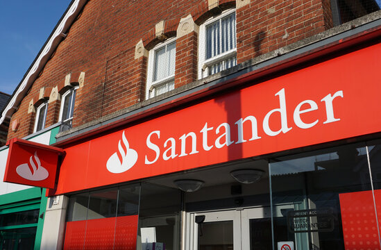 Eastleigh UK 30 August 2023 - Santander bank logo sign on high street branch exterior. Money and finance services 