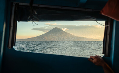 Lake Atitlan in Guatemala. San Pedro Volcano and Toliman Volcano in the background
