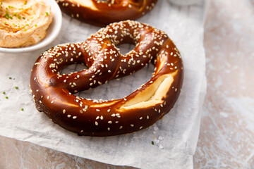 Traditional homemade pretzels with cheese dip