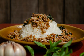 Minced pork with basil over rice is a Thai food that is popular among Thai people