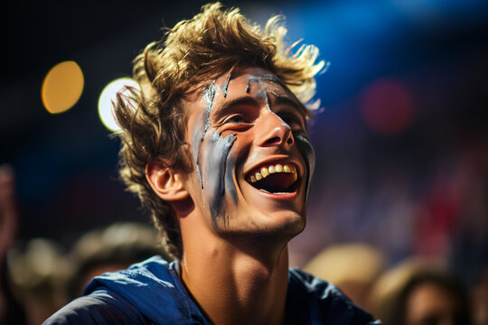 Exhilarating scene of a passionate young fan with French flag painted cheeks, cheering fervently amidst a blurred crowd backdrop, epitome of patriotism and sportive enthusiasm.