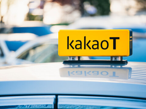 Kakao T sign on taxi Korean transportation service application by Kakao Mobility : Seoul, SOUTH KOREA - APR 14, 2023 
