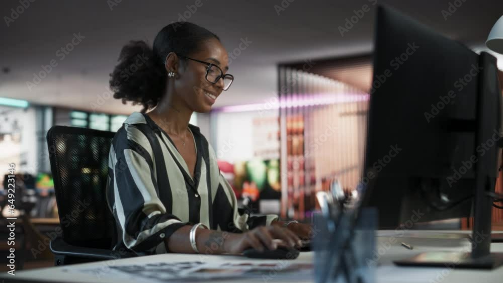 Poster Portrait of a Beautiful Black Woman Using Desktop Computer, Analysing Data, Thinking and Solving Problems. Female Project Manager Working in Creative Agency, Reviewing Social Media Marketing Strategy.