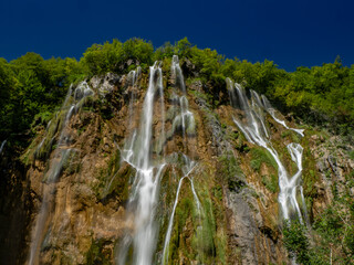 Fototapeta premium Summer view of water lakes and beautiful waterfalls in Plitvice Lakes National Park, Croatia