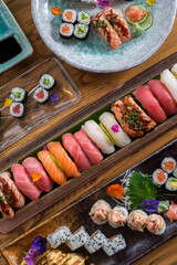 Tasty sushi with rolls with fish