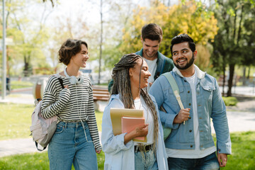 Group of students spending time together in park