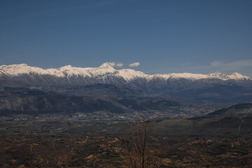 Spring view of the L'Aquila valley in the Abruzzi region. View of the Apennines and