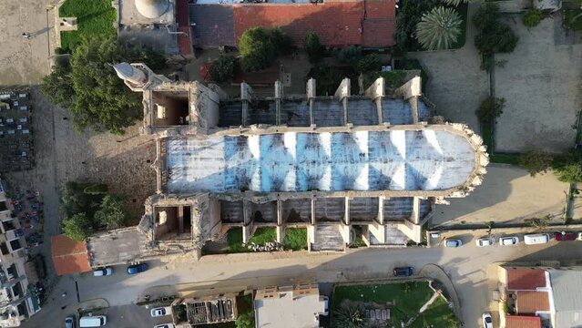 Static drone shot of Lala Mustafa mosque, a former cathedral in the old town of Famagusta city in Northern Cyprus
