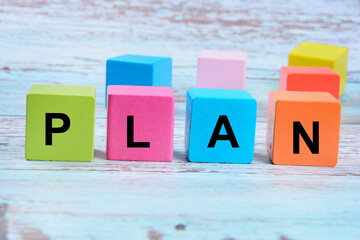 The word Plan word on a colorful wooden cubes