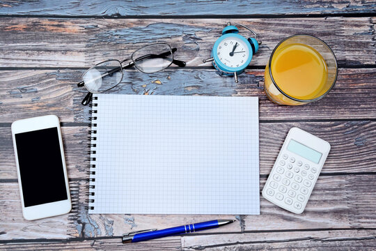 Office supplies on a wooden table