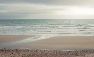 A beautiful sandy beach at sunset