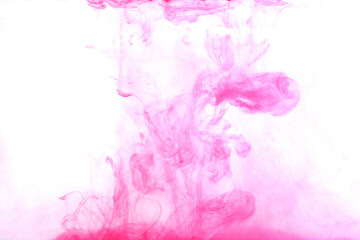 Red-Pink Color dye melt in water on white background,Abstract smoke pattern,Colored liquid dye,Splash paint