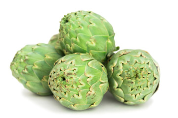 Green artichokes on white background