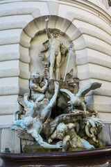 VIENNA, AUSTRIA - Fountain 'Die Macht zur See' by Rudolf Meyr at Michaeler Wing of the Imperial...