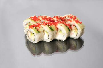 Sushi rolls on white background with reflection, space for text. Japanese food