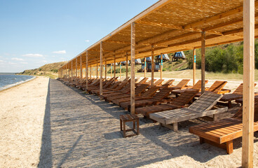Beach chairs on the sea or ocean shore. vacation concept. © Avocado_studio