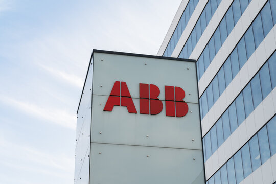 ABB logo sign outside Axis Krak&oacute;w business center, Cracow office building. Multinational corporation, global technology company, electrical equipment manufacturer on August 12, 2023 in Krakow, Poland.