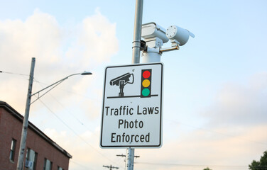 modern security camera mounted on a building, symbolizing surveillance and protection, with a sleek...