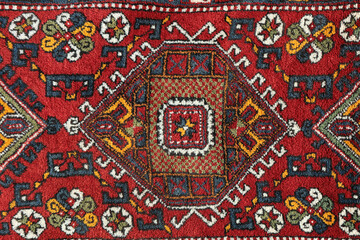 Detail from a traditional Turkish carpet. Hand-woven carpets belong to the late 20th century....