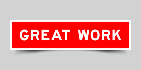 Red color square shape sticker label with word great work on gray background