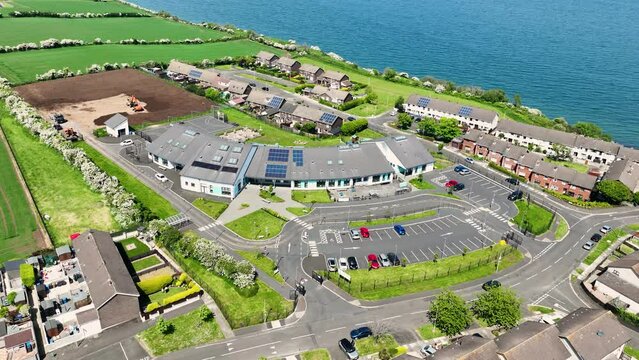 Aerial video of Corran Integrated Primary and Nursery School Larne County Antrim Northern Ireland 2 09-09-2023