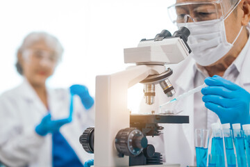 Mature physician asian man and woman people in comprehensive presentation on medical insurance, health lab test results, empowering patients with knowledge. physician expert advice on health coverage