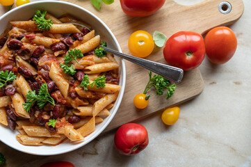 Pasta and beans with homemade tomato sauce on a plate
