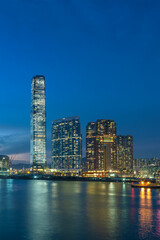 Fototapeta premium Scenery of skyscraper, skyline and harbor of Hong Kong city at dusk