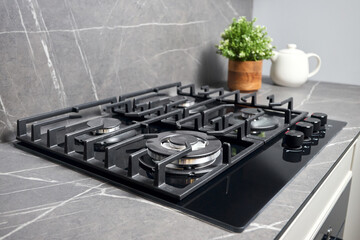 Contemporary black tempered glass gas stove hob with wok burner with auto ignition knob cast iron...